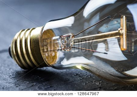 Tungsten Bulb On A Black Table