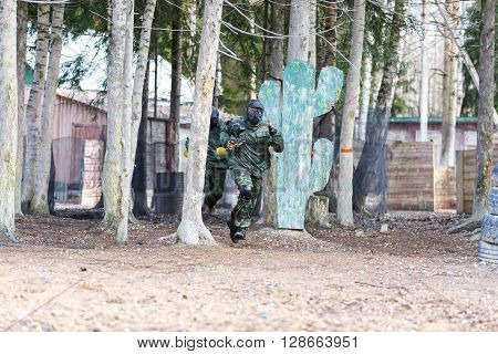 Saint-Petersburg, Russia - April 24, 2016: Paintball tournament in Snaker club between student teams from five universities. Game process.