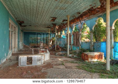 Interior of an abandoned dilapidated restaurant "Gagra" Abkhazia HDR processing