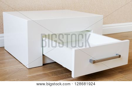 New furniture, bedside table with drawer, close-up