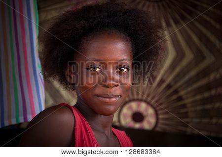 Sierra Leone, West Africa - June 2, 2013: the beaches of the Bunce Island, situated in Freetown Harbour, the typical head of hair with African women