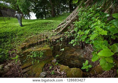 Sierra Leone, West Africa - June 2, 2013: the beaches of the Bunce Island, situated in Freetown Harbour, the remains of the walls of the castle of the slaves