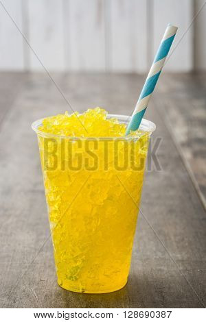 Fresh Lemon slushie on a rustic wood