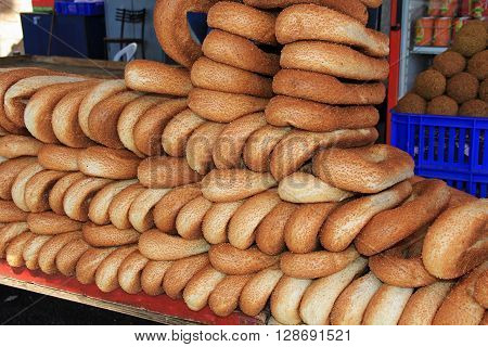 An open air market stall with falafel and bagel bread in the Christian quarter of Old Jerusalem, Israel.  Also known as the Muristan.