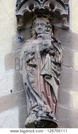 TUBINGEN, GERMANY - OCTOBER 21: Virgin Mary with baby Jesus, Collegiate Church of St. George in Tubingen, Germany on October 21, 2014.