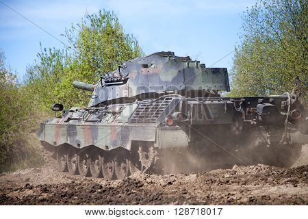 GRIMMEN / GERMANY - MAY 5: german leopard 1 a 5 tank drives on track on a motortechnic festival on may 5 2016 in Grimmen / Germany.
