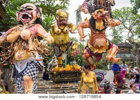 UBUD, BALI - MAR 8, 2016: Unidentified people during the celebration before Nyepi - Balinese Day of Silence. Day Nyepi is also celebrated as New Year - according Balinese calendar now came 1938 year. 