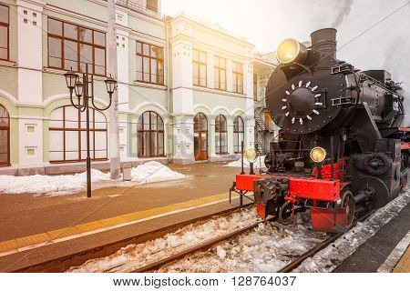 Departure of the retro steam train at spring time.