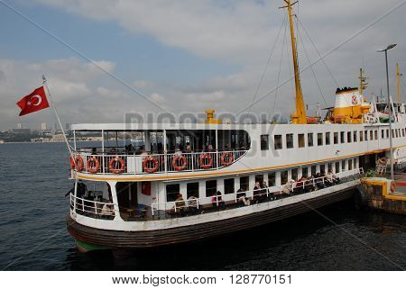 ISTANBUL/TURKEY-OCTOBER 14, 2014: Sehir Hatlari ferry at pier. October 14, 2014-Istanbul/Turkey.