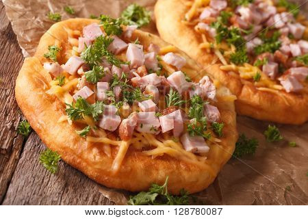 Hungarian Food: Langos With Ham And Cheese Close-up. Horizontal