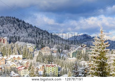 Winter In Carphatian Mountains, Romania. Scenery With Frozen Buildings In Wintertime, Mountains..