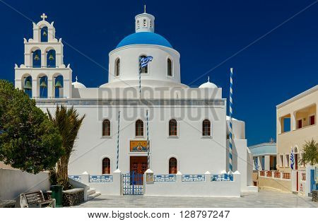 Main white blue orthodox church of Panagia Platsani, in the village of Oia. Santorini.
