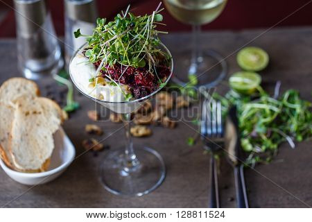 Beet salad in a cocktail glass in a reastaurant