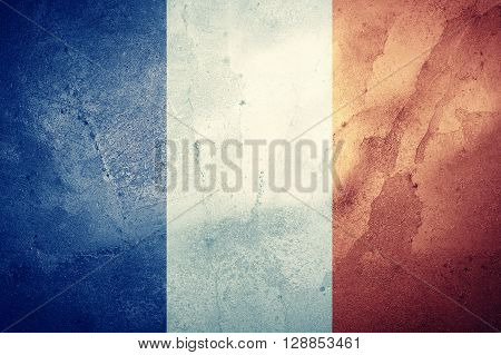A grunge French flag background or texture.