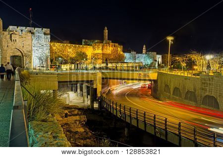 The David's fortress in the bright evening illumination with the Mamilla Road on the foreground Jerusalem Israel.
