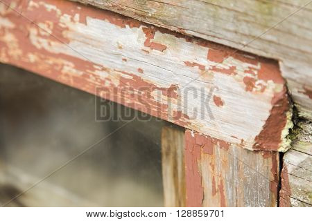 Detail of old window frame made from wood.