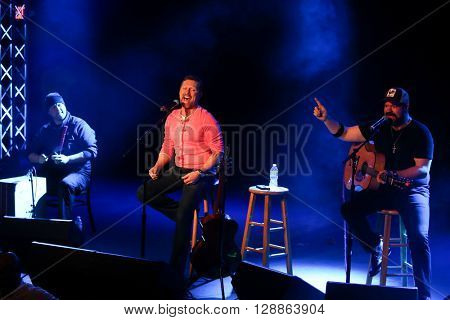 PATCHOGUE, NY-FEB 3: Musician Craig Morgan (C) performs onstage at The Emporium on February 3, 2016 in Patchogue, New York.