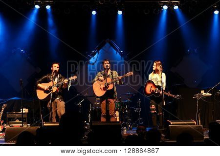 HUNTINGTON, NY-MAR 26: (L-R) Elijah Edwards, Mason Van Valin and Megan McAllister of Fairground Saints perform onstage at the Paramount on March 26, 2016 in Huntington, New York.