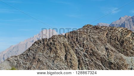 In Oman  The Old Mountain Gorge And Canyon The Deep Cloudy  Sky