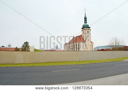 sping evening photo of Church Kostel Nanebevzetí Panny Marie in industrial city Most was moved before coal mining in year 1975