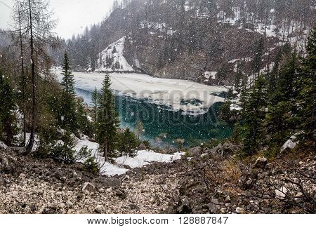 Crno jezero (Black lake) in Slovenian Alps in snowy winter weather