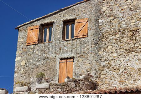 Facade of French House with Door and Windows in Roquebrune-Cap-Martin France