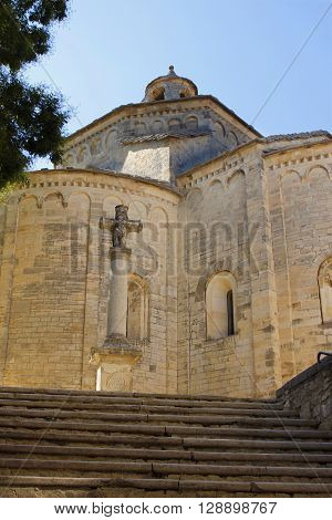 Saint Guilhem le desert church in a cloudy day Details in Saint Guilhem le desert a town in south of France