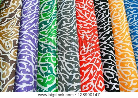 Colorful textile at market ready for sale