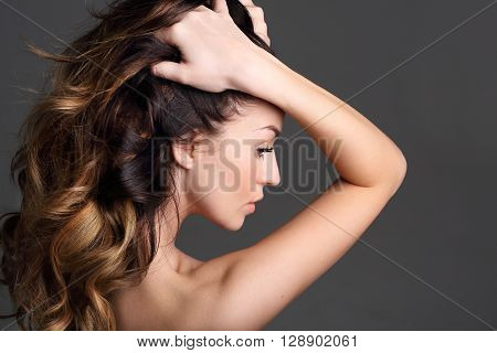 Strong healthy hair. Solar ombre, natural hairstyle long hair