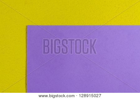 Eva foam ethylene vinyl acetate smooth light purple surface on lemon yellow sponge plush background