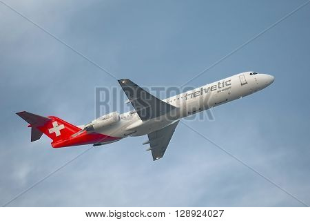 BUDAPEST, HUNGARY - OCTOBER 4, 2014: Airliner of Helvetic Airways is departing from Budapest, October 4th 2014.