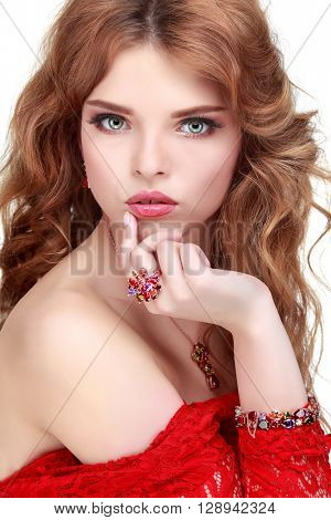 A beautiful young whiteheaded woman is in red clothes, isolated on a white background