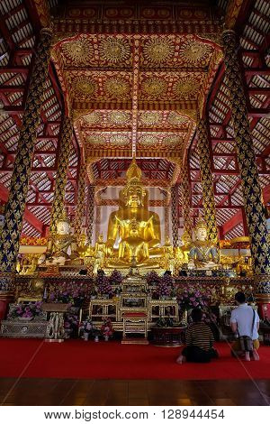 Golden Buddha Statue In Wat Suan Dok Temple, Chiang Mai, Thailand