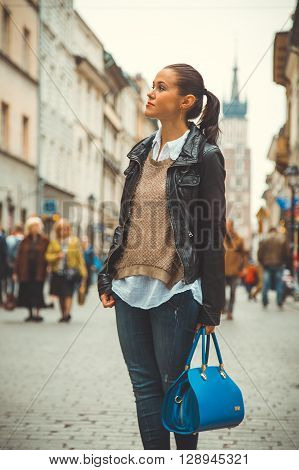 Beautiful girl traveling in the ancient town