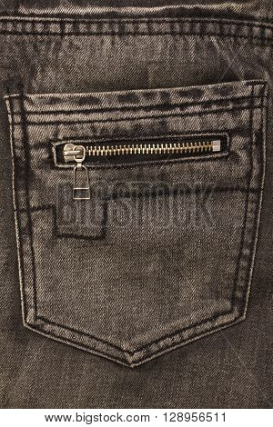 gray jeans back pocket with zip lock closeup