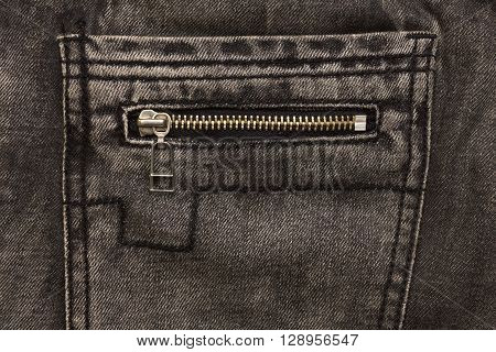 gray jeans back pocket with zip lock closeup