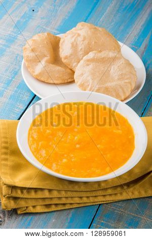 Aamras or Aam Ras Puri: Puri which is an indian fried small bread and alphonso mango pulp is a popular lunch especially during Padwa, the Marathi new year, maharashtrian lunch/dinner menu
