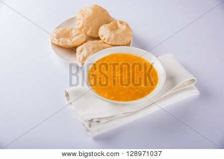 Aamras or Aam Ras Puri: Puri which is an indian fried small bread and alphonso mango pulp is a popular lunch especially during Padwa, the Marathi new year, maharashtrian lunch/dinner menu