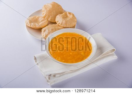 Aamras or Aam Ras Puri: Puri which is an indian fried small bread and alphonso mango pulp is a popular lunch especially during Padwa, the Marathi new year, maharashtrian lunch/dinner menu