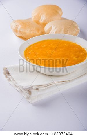 Aamras or Aam Ras Puri: Puri which is an indian fried small bread and alphonso mango pulp is a popular lunch especially during Padwa, the Marathi new year, maharashtrian lunch/dinner menu