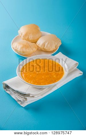 Aamras or Aam Ras Puri: Puri which is an indian fried small bread and alphonso mango pulp is a popular lunch especially during Padwa, the Marathi new year, maharashtrian lunch/dinner menu
