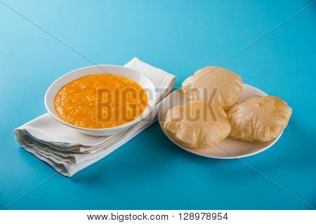 Aamras or Aam Ras Puri: Puri which is an indian fried small bread and alphonso mango pulp is a popular lunch especially during Padwa, the Marathi new year, maharashtrian lunch/dinner menu
