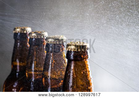 Ice Cold Beer Bottles With Drops Of Dew