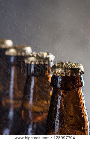 Ice Cold Beer Bottles With Drops Of Dew