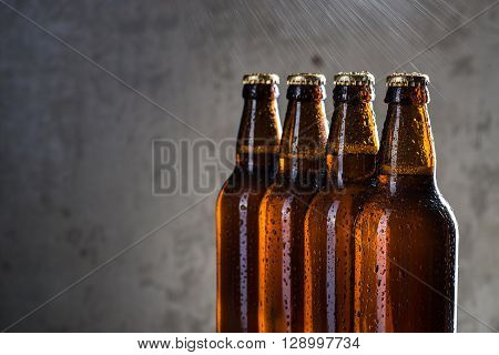 Ice Cold Beer Bottles With Drops Of Dew