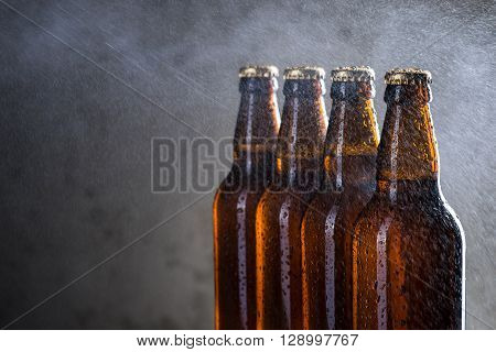 Ice Cold Beer Bottles With Drops Of Dew