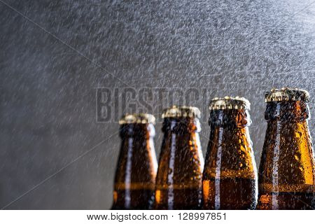 Ice Cold Beer Bottles With Drops Of Dew