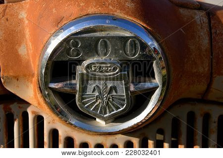 Isabel, South Dakota, June 22, 2017: The Rusty Ford Tractor 800 Series  Originated In Dearborn, Mich