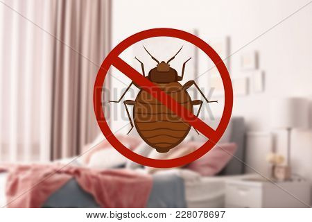 Stop bug sign and clean bed in room