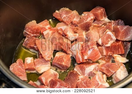 Chopped Pork Meat Cooking In Slow Cooker